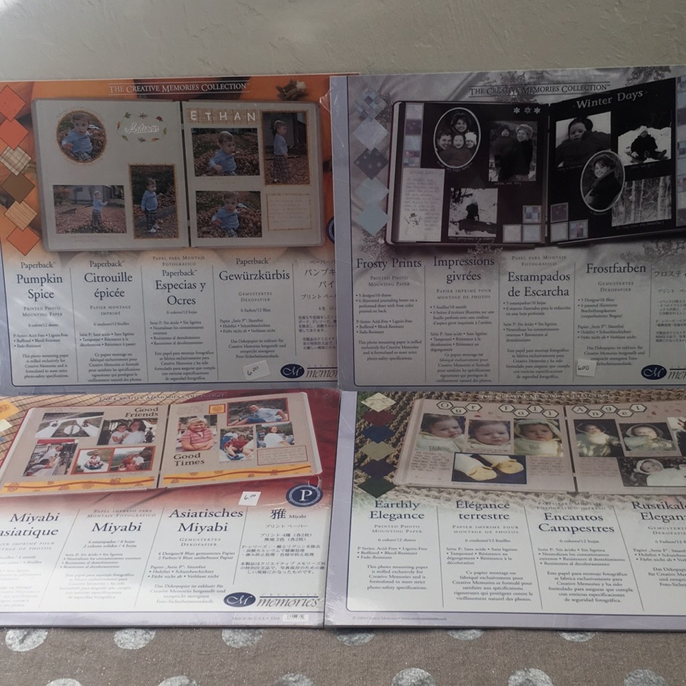 4 Creative Memories Paper Packs 
NIP